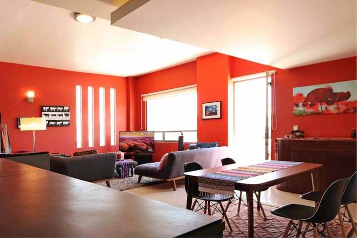 Living, dining and kitchen in one open space