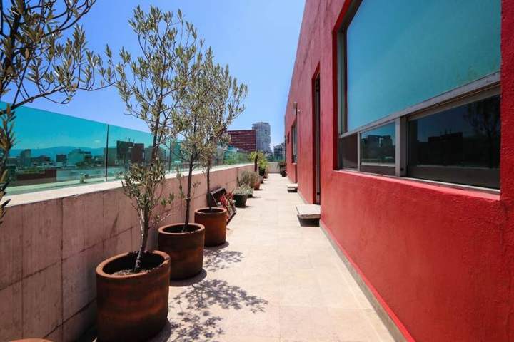 The terrace runs the whole length of the apartment